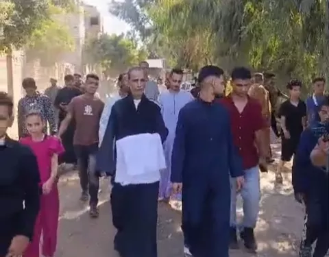 مشهد الكفن مشهد خلال مراسم الصلح الثأري في مغاغة بالمنيا