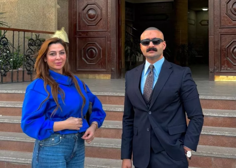 المحامي عبد الله منصور وموكلته