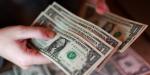 يلامس الـ 52 .. سعر صرف الدولار الآن مقابل الجنيه