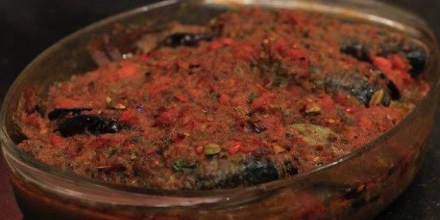 طريقة عمل طاجن السمك بالصلصة